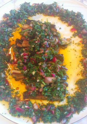 A picture of Zucchini with chermoulla dressing.