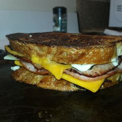 A picture of Ultimate Grilled ham and cheese sandwich with Bacon.