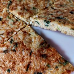 A picture of Egg 🥚 and rice omellete/breakfast recipe.