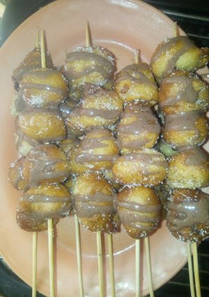 A picture of Chocolate topped puffs.