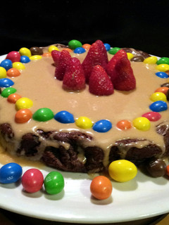A picture of AMIEs Peanut Butter Brownies Cake.