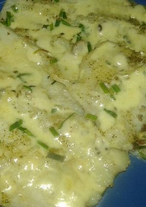 Una foto de Pejerrey al roquefort con suelo de semillas