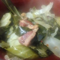 A picture of Greens and cabbage.