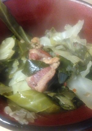A picture of Greens and cabbage.