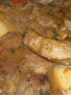 A picture of PORK CHOP ALL IN ONE SKILLET DINNER.