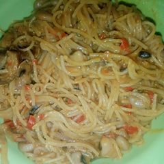 A picture of Jollof Spaghetti and Beans.