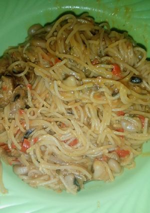 A picture of Jollof Spaghetti and Beans.
