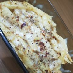 A picture of Restaurant style cheese fries.