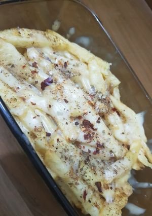 A picture of Restaurant style cheese fries.