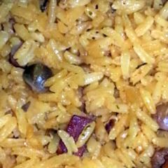A picture of Arroz con Gandules / Rice w Pigeon Peas.