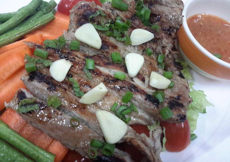 Recipe of Homemade Moo Kam Waan / Thai style Grilled Pork serve with Spicy Sauce and fresh vegetables