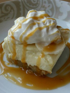 A picture of Vickys Banana Pudding Poke Cake, GF DF EF SF NF.