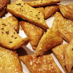 A picture of Savory sesame seed cheese crisps.