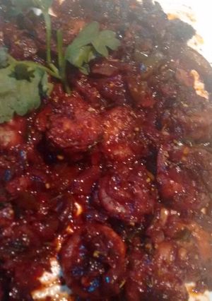 A picture of Shrimp scampi in red wine tomatino.