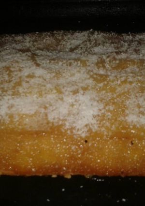 Una foto de Torta de manzana y coco