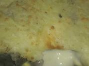 Una foto de patatas con carne picada