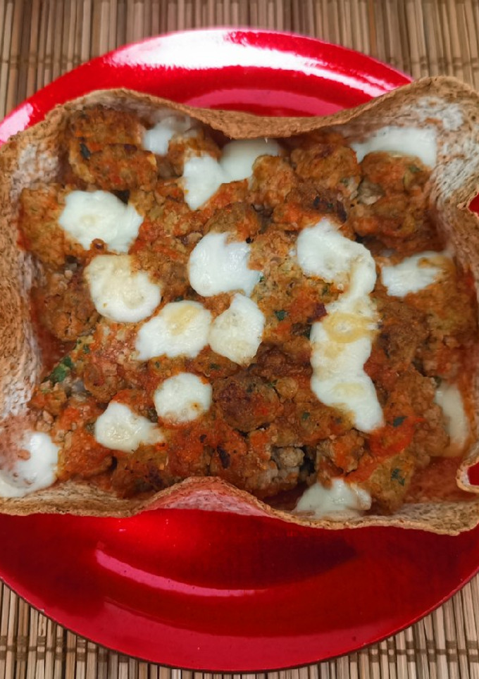 Una foto de Cestita de boloñesa