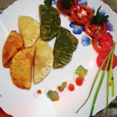 Tricolor cheese gujiya A picture of Tricolor cheese gujiya.