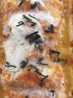 Una foto de Canelones de berenjena gratinados con Burrata