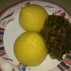 A picture of Eba wit vegetable soup (ugu n water leaf).