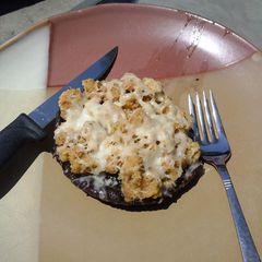 A picture of Grilled Portobello Mushrooms/ w Crabmeat Stuffing.