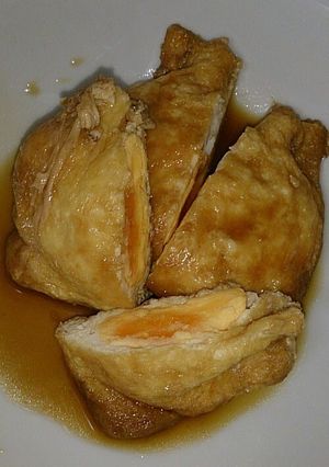 A picture of Aburaage "Kinchaku" Pouches Stuffed with Boiled Eggs.