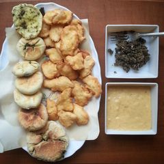 A picture of Spicy mango dipping and homemade bread dips.