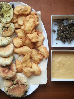 A picture of Spicy mango dipping and homemade bread dips.