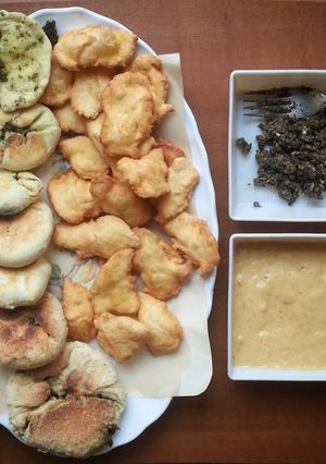 A picture of Spicy mango dipping and homemade bread dips.