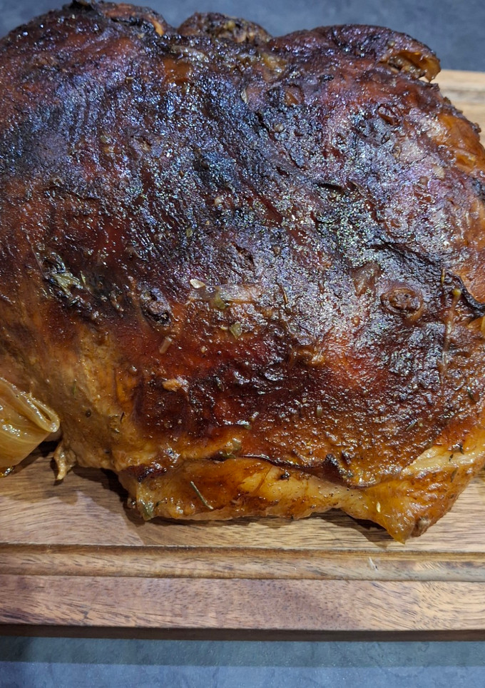 A picture of Slow Roasted Greek Leg of Lamb.