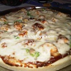 A picture of BBQ Chicken Pizza with a Chewy Pizza Crust.