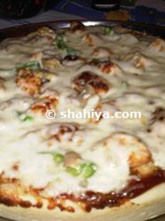 A picture of BBQ Chicken Pizza with a Chewy Pizza Crust.