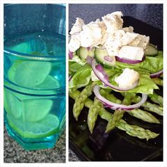 A picture of chicken and asparagus salad, lime water.