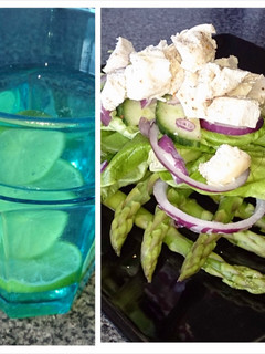 A picture of chicken and asparagus salad, lime water.