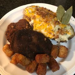 A picture of Leftover meatloaf and baked potato.