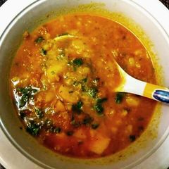 A picture of Potato and tomato curry.