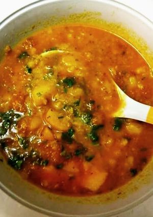 A picture of Potato and tomato curry.
