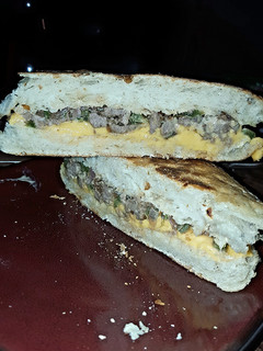 A picture of Cheese steak sandwich.