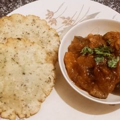 A picture of Khatta Meeta Kaddu (pumpkin) with Samak poori.