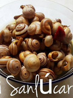 Una foto de Tapa típica de caracoles