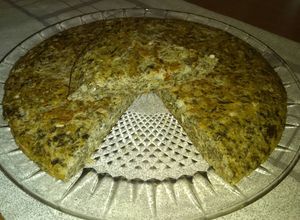 Una foto de Tortilla de espinaca, patata, atún y queso
