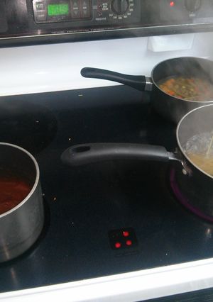 A picture of Spaghetti with Red Sauce and Chicken, Mixed Vegetables.