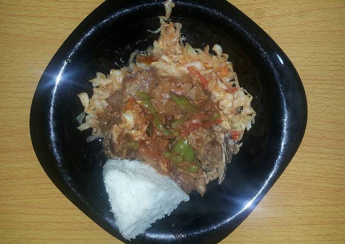 Beef stew with cabbage fried served with ugali