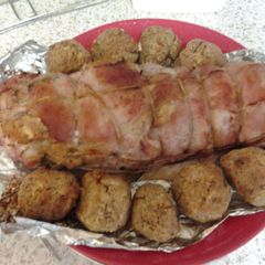 A picture of My giant stuffed pig in a Blanket.