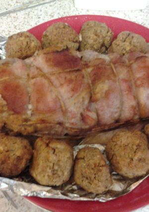 A picture of My giant stuffed pig in a Blanket.
