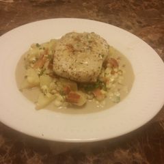 A picture of Marsala Pork Chops with Corn and Bacon.