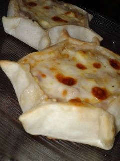 Una foto de Tartaletas de choclo y salsa blanca
