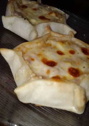 Una foto de Tartaletas de choclo y salsa blanca