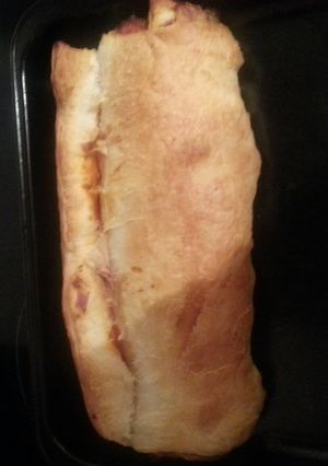 A picture of Tomato cheese and olive log.