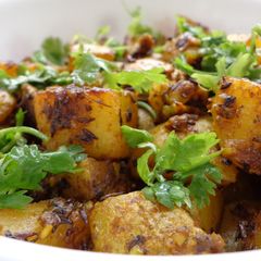 A picture of Potatoes fried with skin.